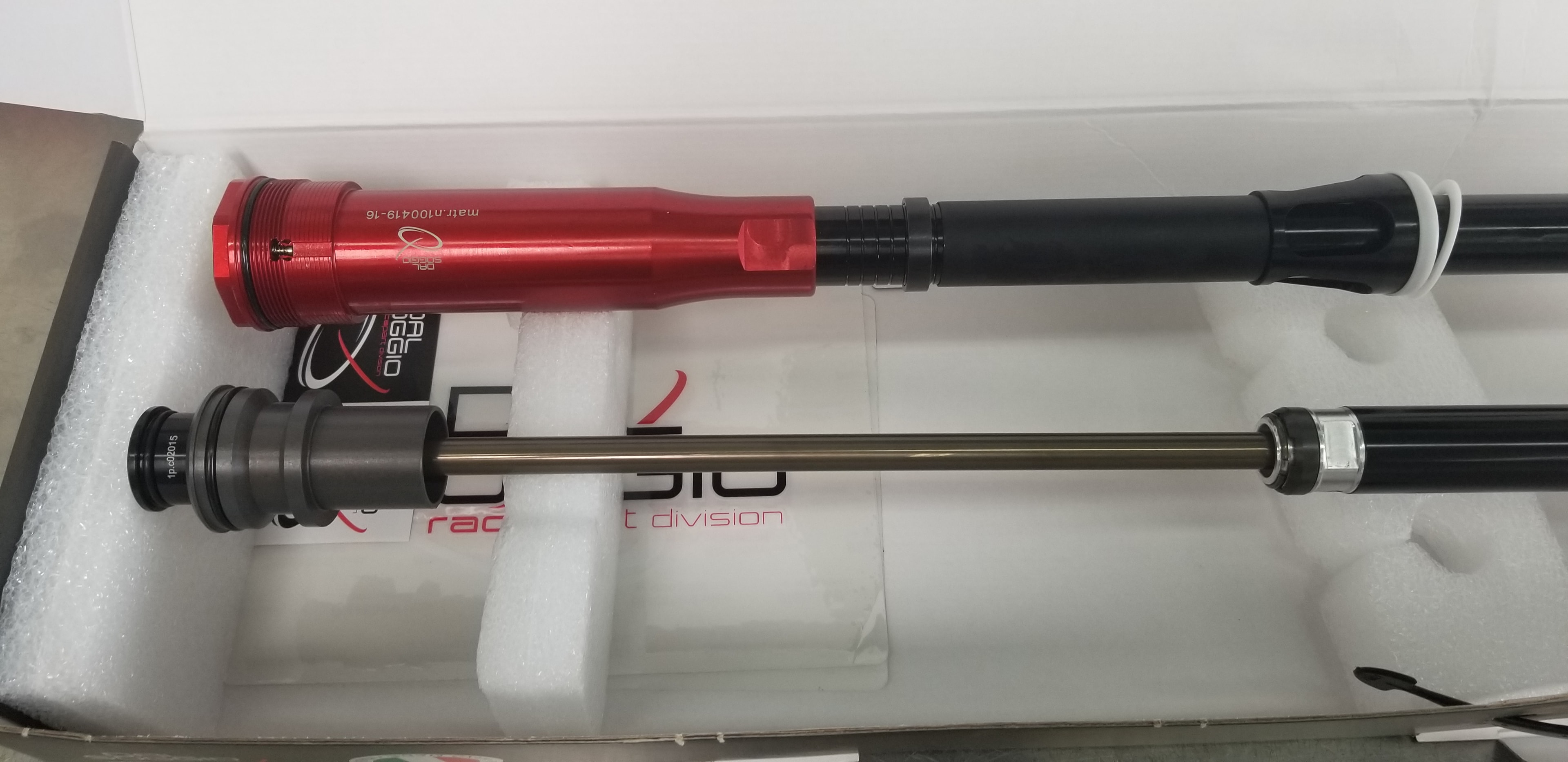 Dal Soggio suspension fork internals — red anodized cartridge