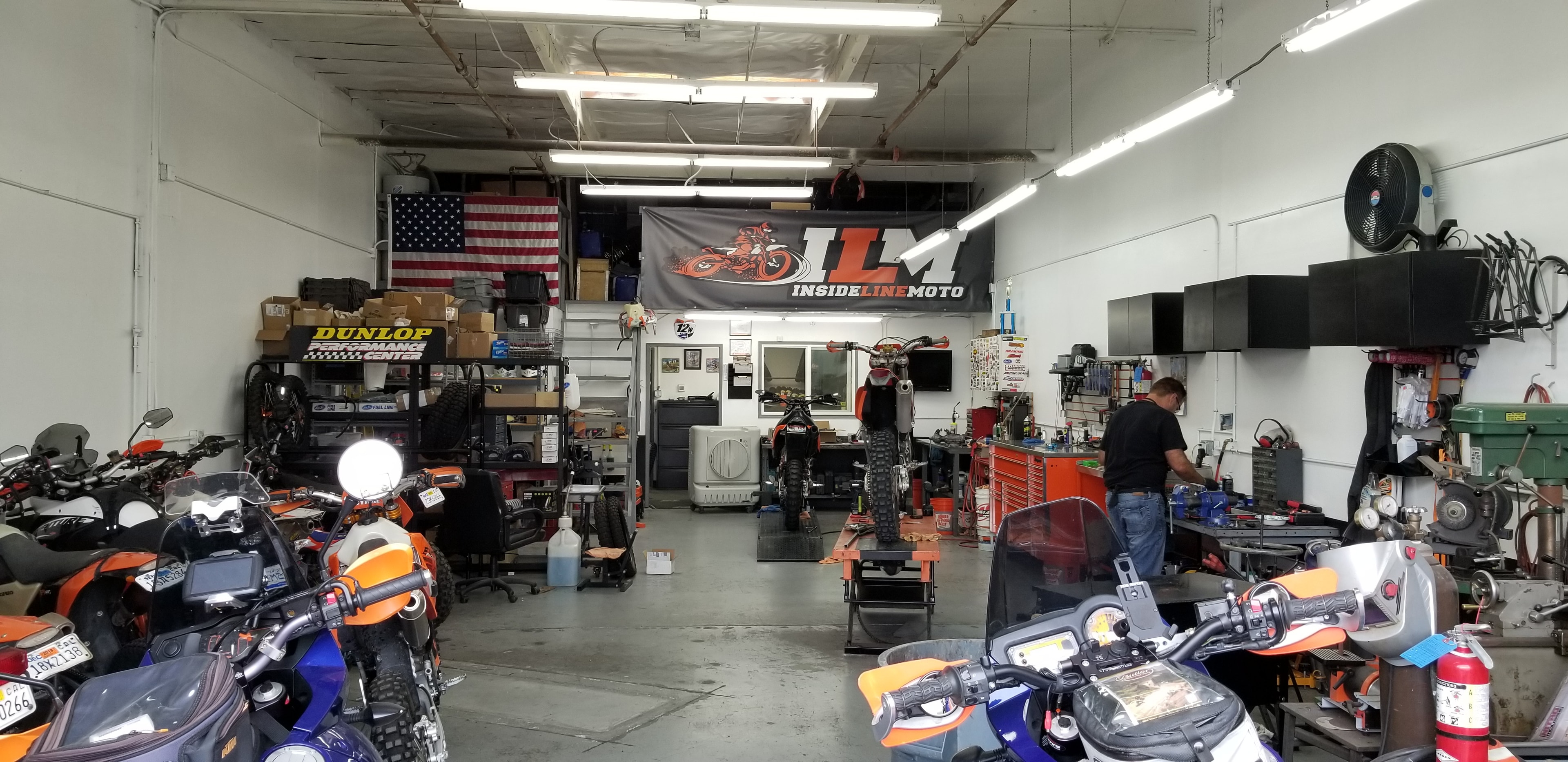 ILM service bay with motorcycles in for repair