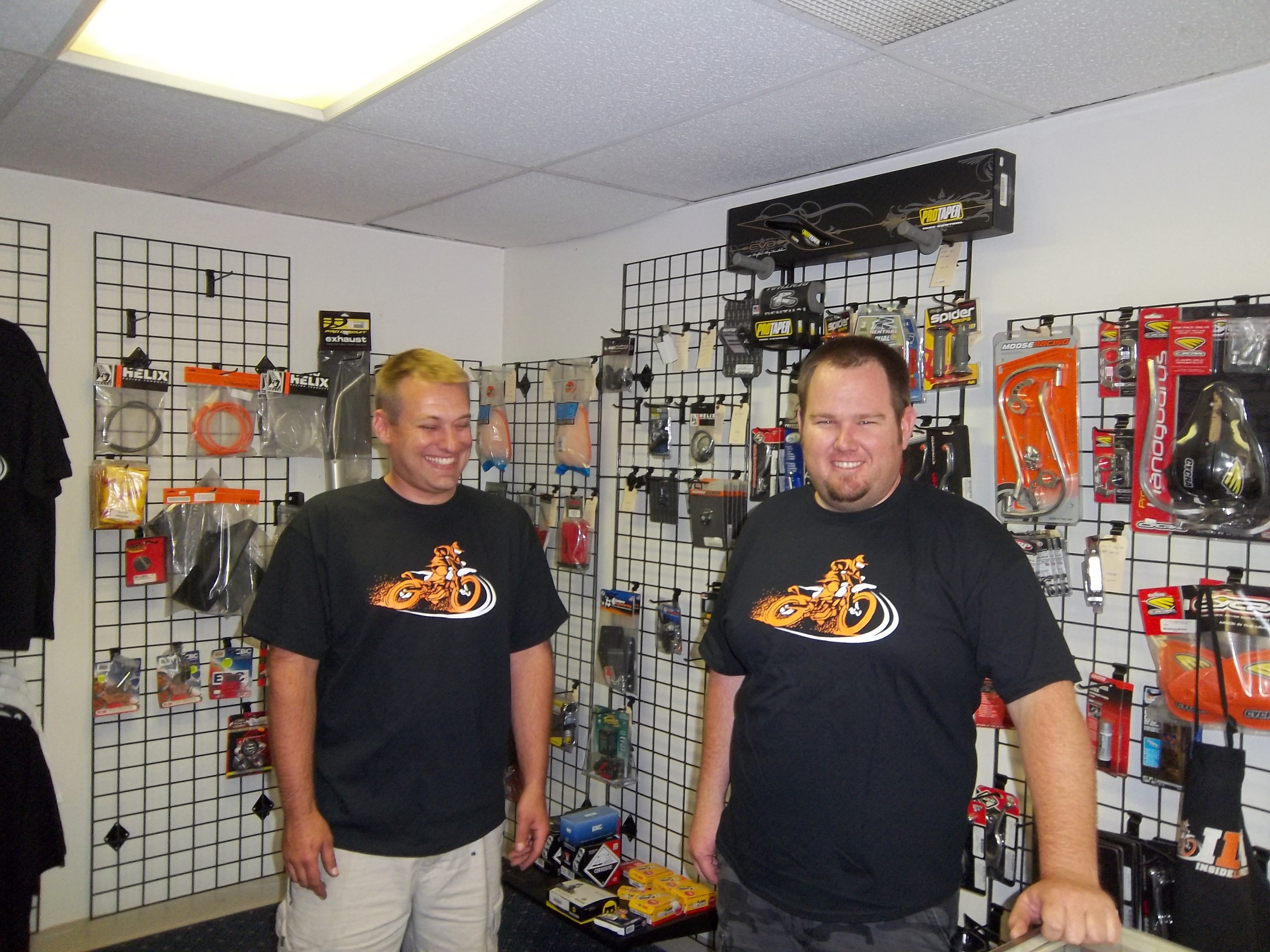 Two men in the ILM motorcycle shop
