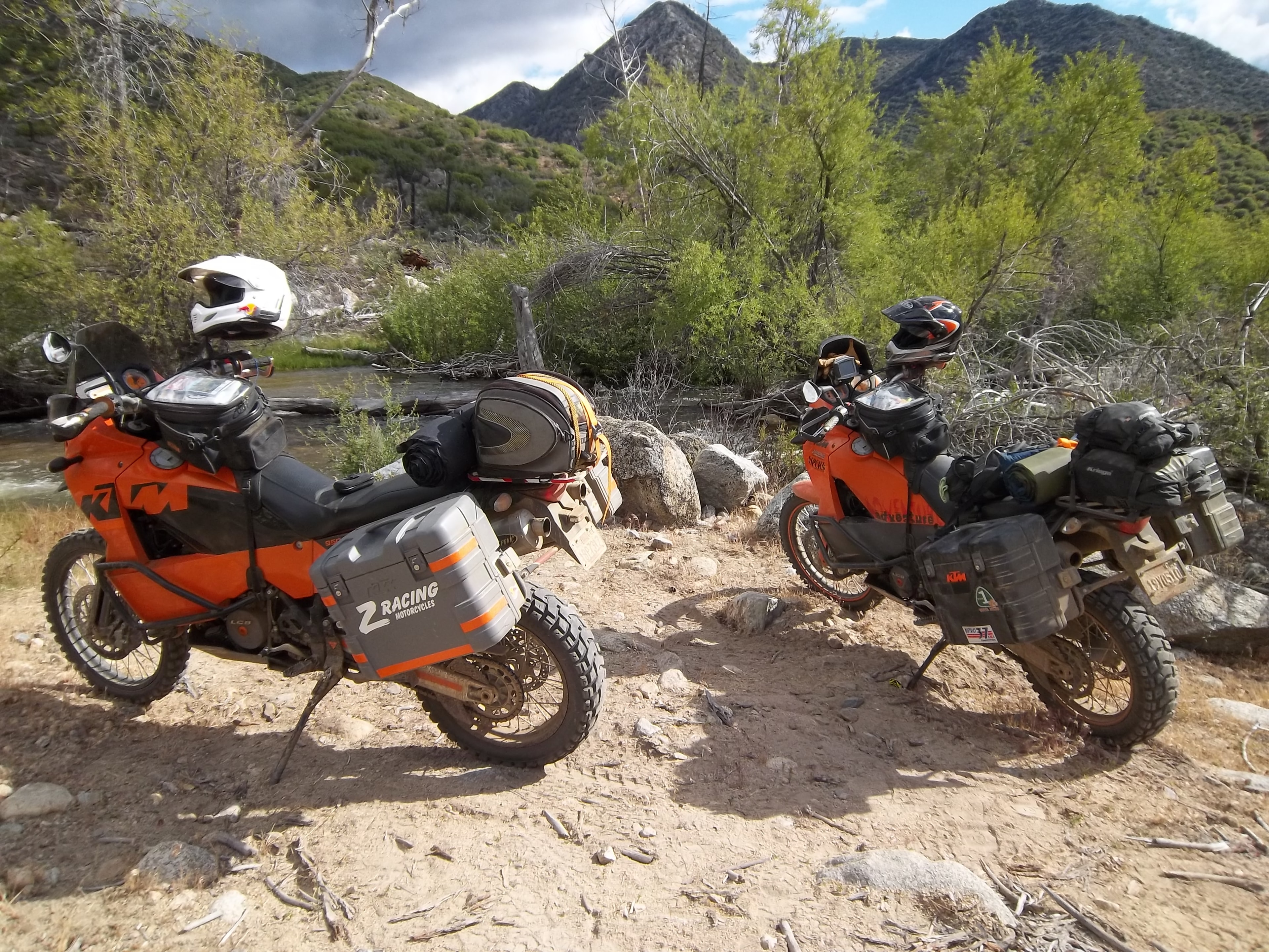 Motorcycle riders camping in the desert mountains